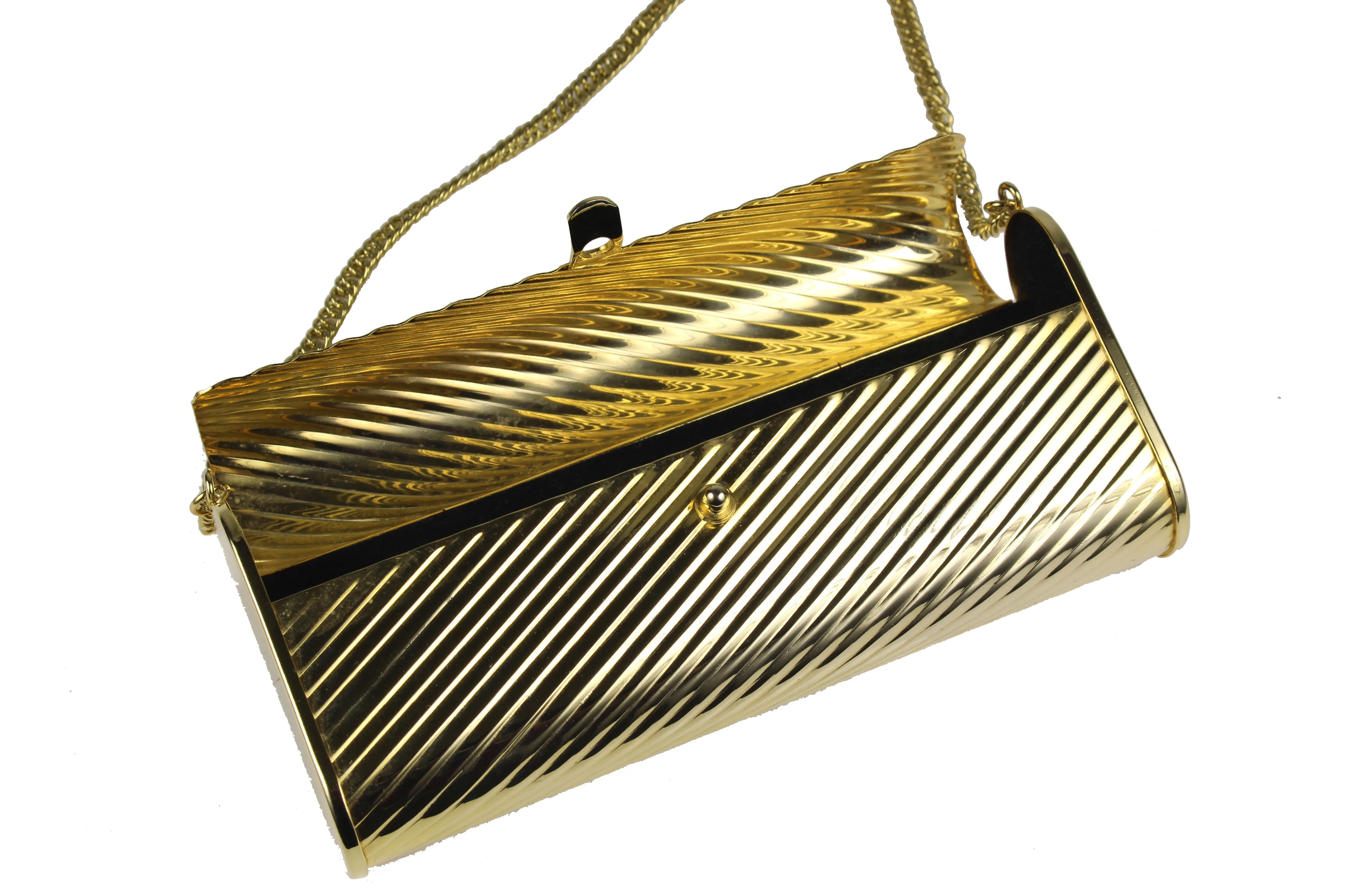 Gold metal flap clutch with diagonal engraving